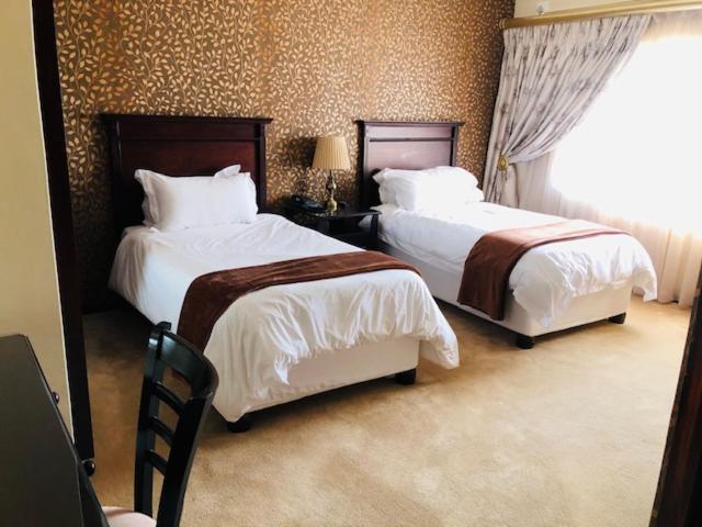 Ekupholeni Garden Villas Манзини Екстериор снимка